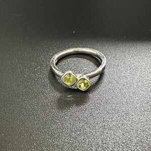 Elegant Silver Ring with Green Gemstones